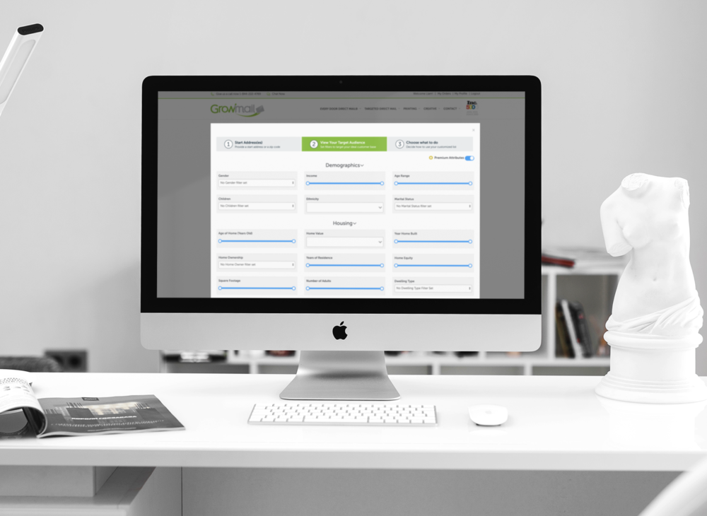 An iMac desktop in an modern office with targeted direct mail software.